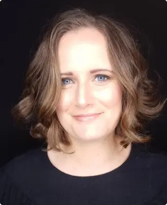 Portrait of Emily Yates Giulioni, highlighting her academic contributions.