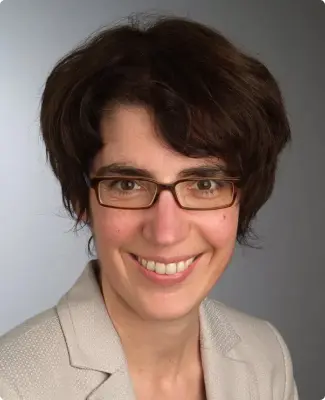 Katrin Amian, PhD Portrait of Katrin Amian, PhD, showcasing her research achievements.