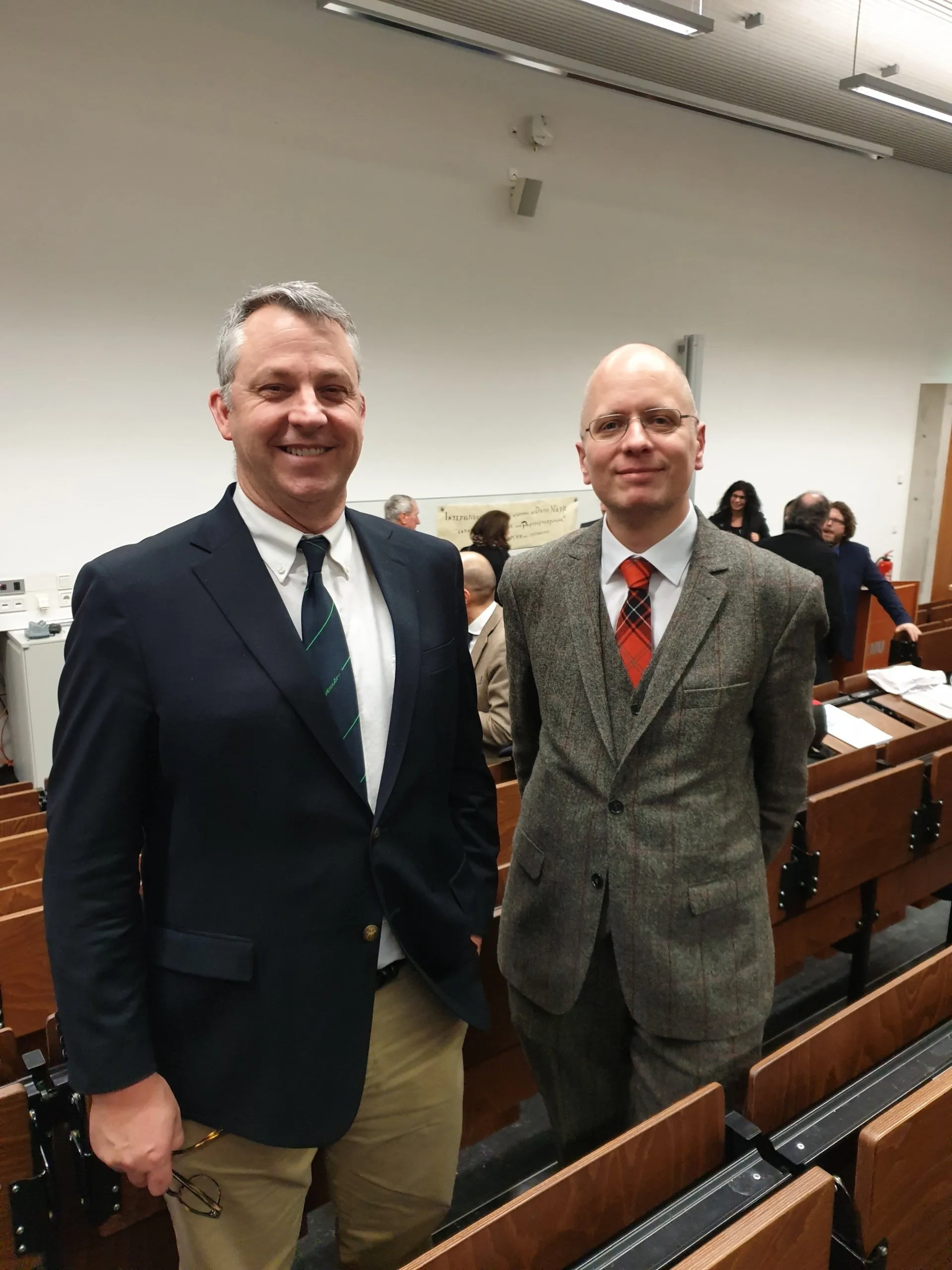 Portrait of Prof. Robert M. Frakes with Prof. Johannes Platschek, highlighting their collaborative research.