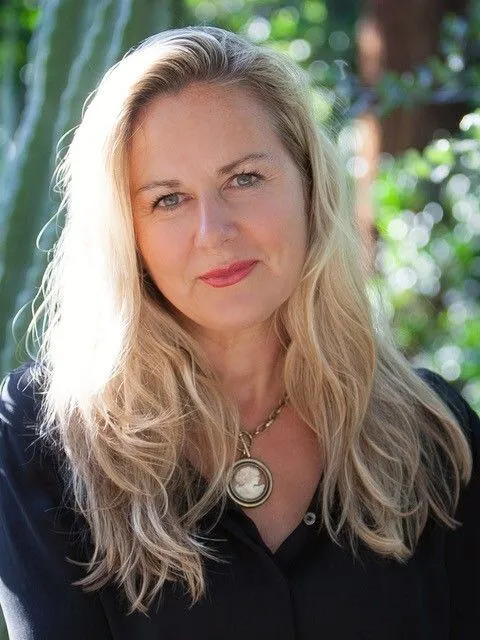 Portrait of Sandra Rebok, highlighting her research contributions.