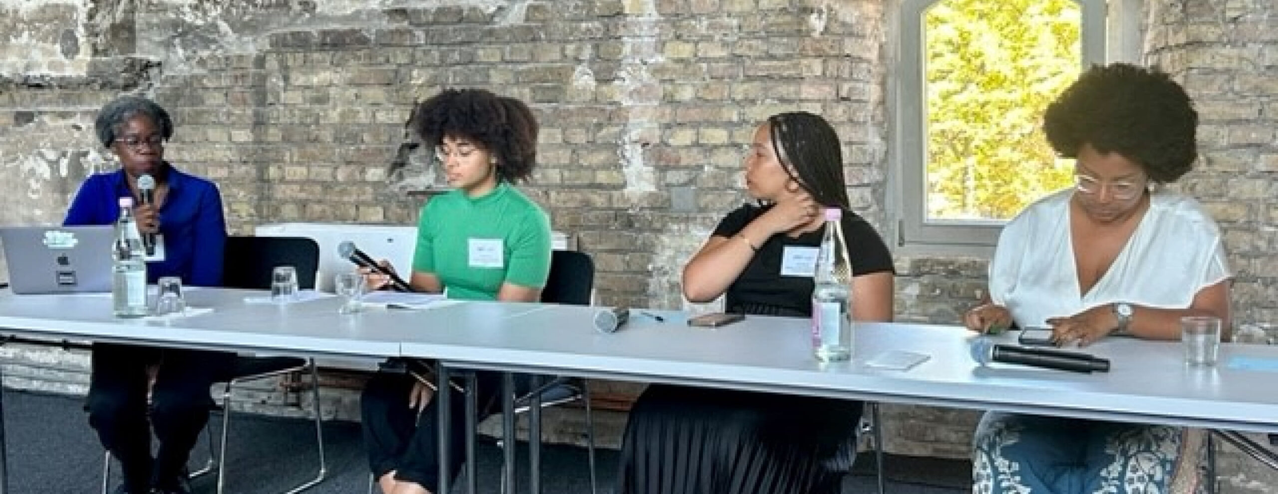 Photo of Andrea Stith, Lara Martins, Verity Cook, and Erin Moody.
