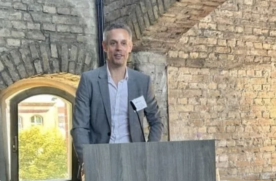 Photo of AFAvH President Christian Haenel presenting in Berlin.